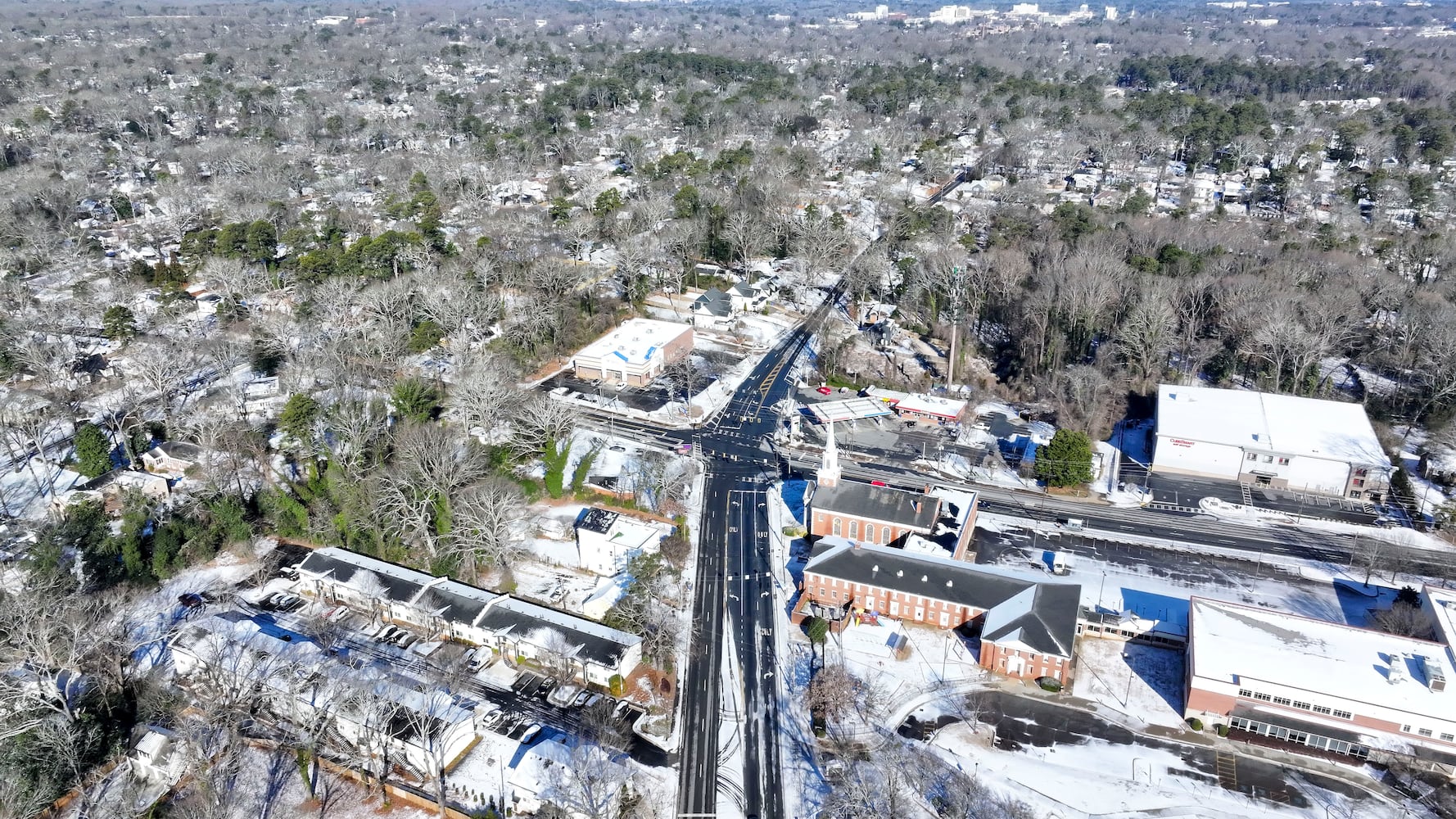 In this aerial image, some roads started to improve in Dekalb County a day after a winter storm struck Metro Atlanta. Authorities advised residents to stay home due to icy road conditions on Wednesday, January 22, 2025,
(Miguel Martinez/ AJC)