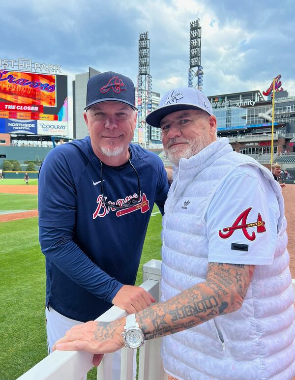 Steve Disney (right) met Chipper Jones, a Braves hall of famer and hitting consultant, in spring 2023 and showed Jones the tattoo in his honor. Photo: Courtesy of Steve Disney