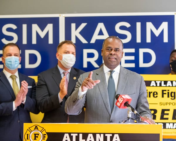 Former mayor Kasim Reed accepts an endorsement from the International Association of Fire Fighters Local 134 on Thursday. (Jenni Girtman for The Atlanta Journal-Constitution)