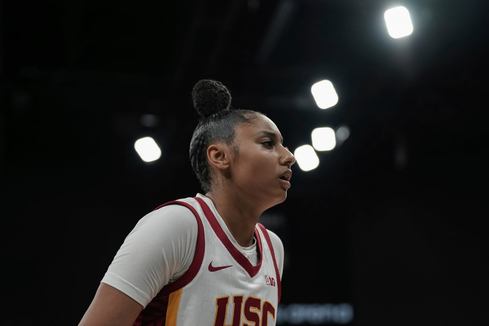 USC Trojans's guard Juju Watkins reacts during the basketball match between the University of Southern California (USC) and Ole Miss, Monday, Nov. 4, 2024 in Paris, France. (AP Photo/Aurelien Morissard)