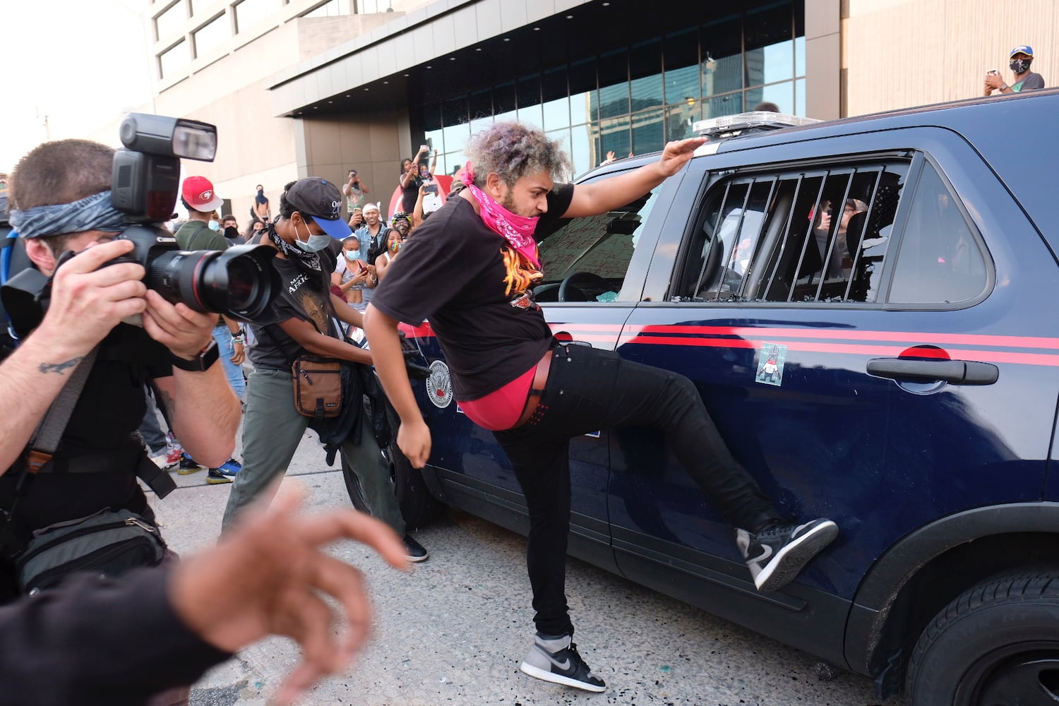 PHOTOS: Atlanta rally against police violence draws hundreds, turns violent