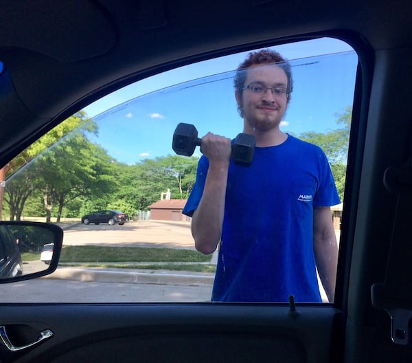 He was always going to beat it. As he continued chemotherapy, Michael pushed himself physically. Here he is at a road stop on a 2018 trip to Illinois. (Photo by Bill Torpy)