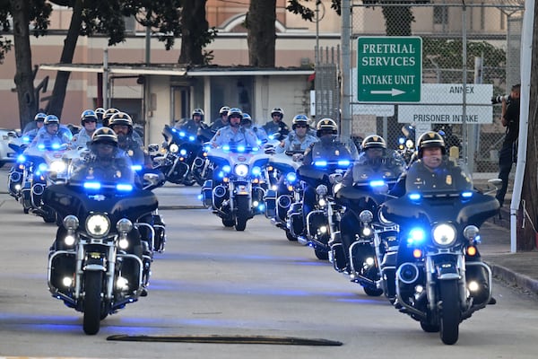 Former President Donald Trump’s motorcades leave the Fulton County Jail, Thursday, August 24, 2023, in Atlanta. (Hyosub Shin/hyosub.shin@ajc.com)