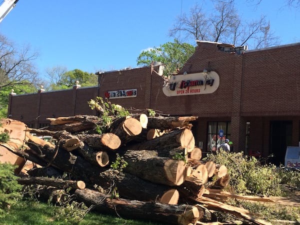 A massive tree fell on the CVS in Grant Park on Thursday. // Tom Kelley, AJC