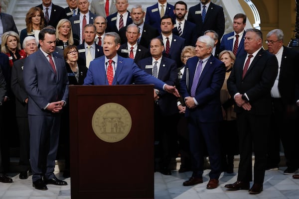 Gov. Brian Kemp, flanked by Lieutenant Governor Burt Jones, Speaker of the House Jon Burns, and Insurance Commissioner John King, answer questions on Wednesday, January 15, 2025.
(Miguel Martinez / AJC)