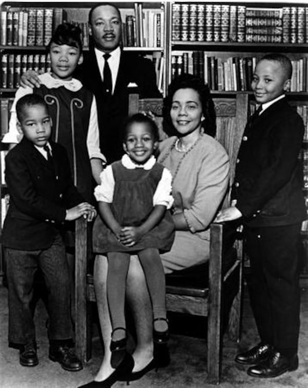 Happier times. Martin Luther King Jr., the pastor and globally renowned civil rights leader is seen with his wife Coretta and children (left to right) Dexter, Yolanda and Martin Luther King III with Bernice sitting on her mother’s lap. AJC file photo