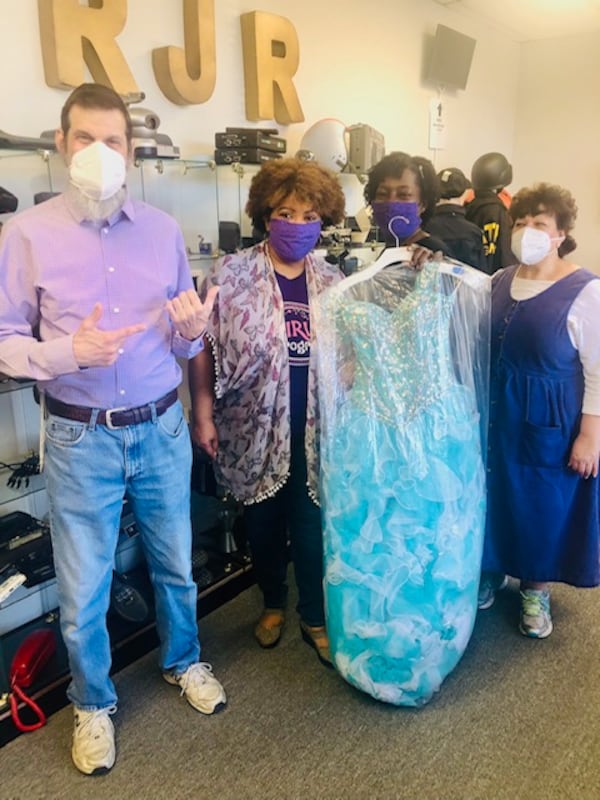 RJR Props donated 41 glamorous gowns to Enchanted Closet. The dresses were part of a bridal store on a movie set. From left: Rich Rappaport, Bonita Johnson, Enchanted Closet CEO Carla Stafford, a longtime Enchanted Closet volunteer and board member, Lori Rappaport. Photo courtesy of Enchanted Closet