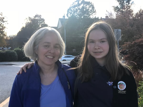 Pictured with her mother Laura Northup, tirst-time voter Julia Northup, 18,  said gun control issues brought her to the polls.