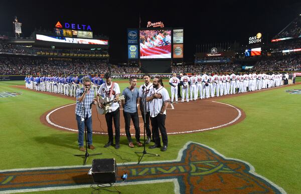 Ed Roland and the Sweet Tea Project performed the national anthem before a Braves game last month. Now they'll move on to the Hawks. HYOSUB SHIN / HSHIN@AJC.COM