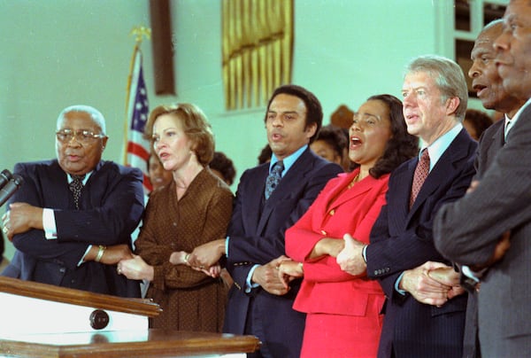 President Jimmy Carter sings with, from left, Martin Luther King Sr., Rosalynn Carter, Andrew Young and Coretta Scott King at Ebenezer Baptist Church in Atlanta on Jan. 14, 1979. Carter was there to accept the Martin Luther King Jr. Nonviolence Peace Prize. (Jimmy Carter Library)