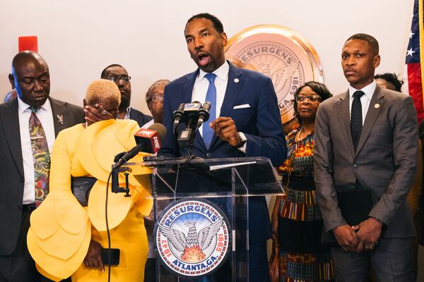 Atlanta Mayor Andre Dickens confronts the Millennia apartments management for mistreatment of its residents not only in the Forest Cove, but within Millennia's properties throughout the US. He warns them of an incoming lawsuit from the City of Atlanta at the Atlanta City Hall on Friday, Oct. 6, 2023. (Olivia Bowdoin for the AJC). 