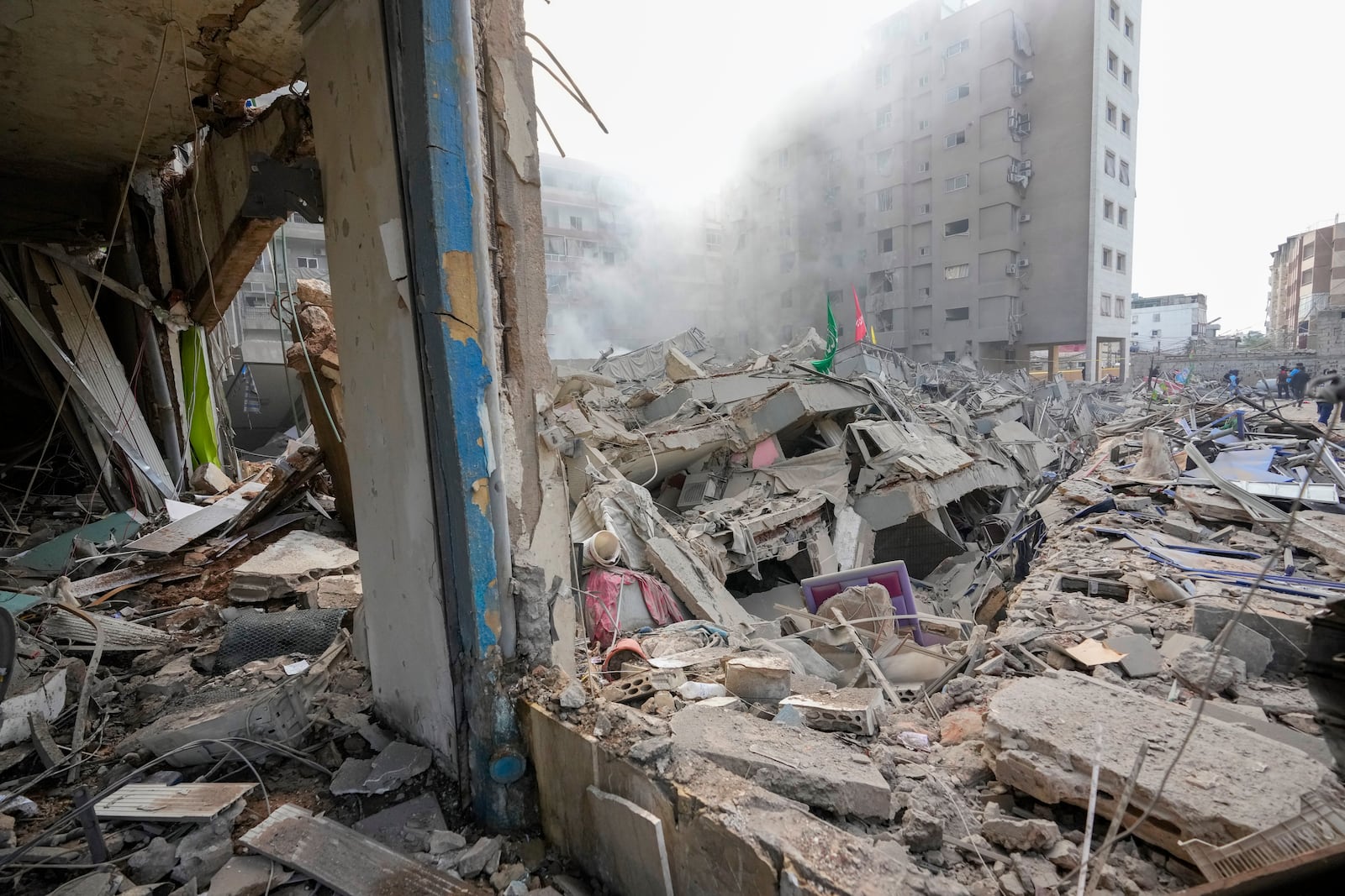 Smoke rises from the site of an Israeli airstrike in Dahiyeh, Beirut, Lebanon, Friday, Nov. 1, 2024. (AP Photo/Hassan Ammar)