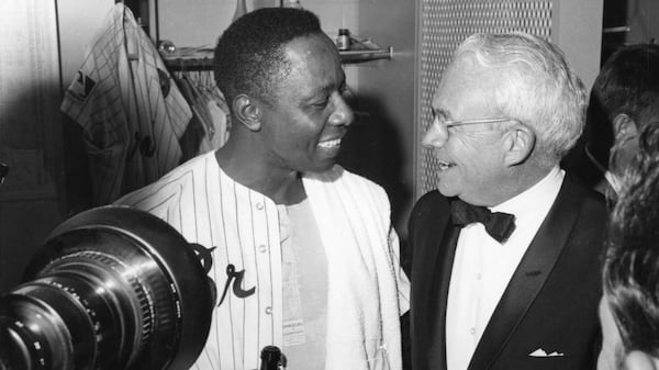 When the Braves won their first NL West title in 1969, Atlanta Mayor Ivan Allen Jr. celebrated with future home run king Hank Aaron.