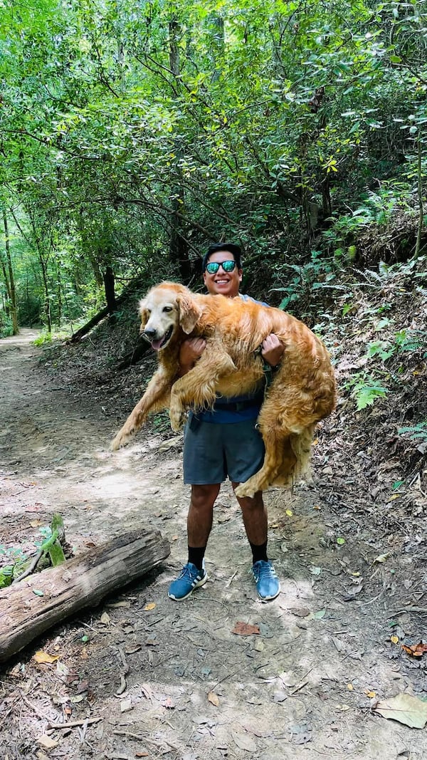 Bryan Santana tried to carry Prince down the mountain himself, but the 100-pound dog was too heavy. Courtesy of Cheryl Hite