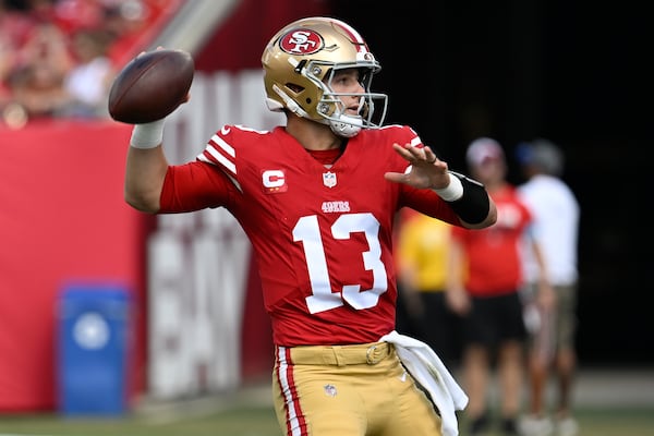 San Francisco 49ers quarterback Brock Purdy (13) passes against the Tampa Bay Buccaneers during the first half of an NFL football game in Tampa, Fla., Sunday, Nov. 10, 2024. (AP Photo/Jason Behnken)