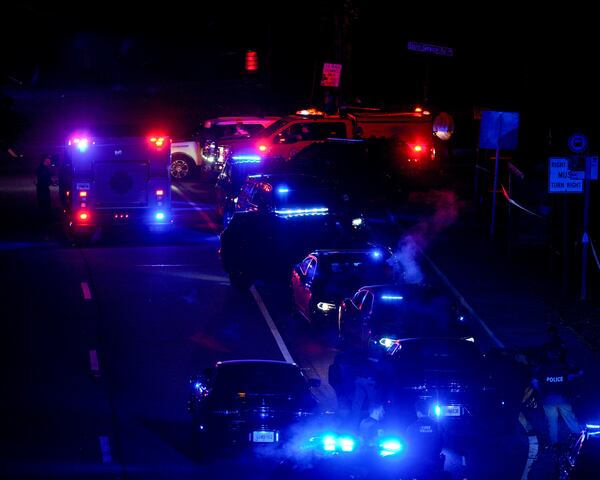 Police shot a suspect outside Six Flags Over Georgia on Saturday evening after a large “unruly crowd” caused chaos inside the park on the opening day of the season.