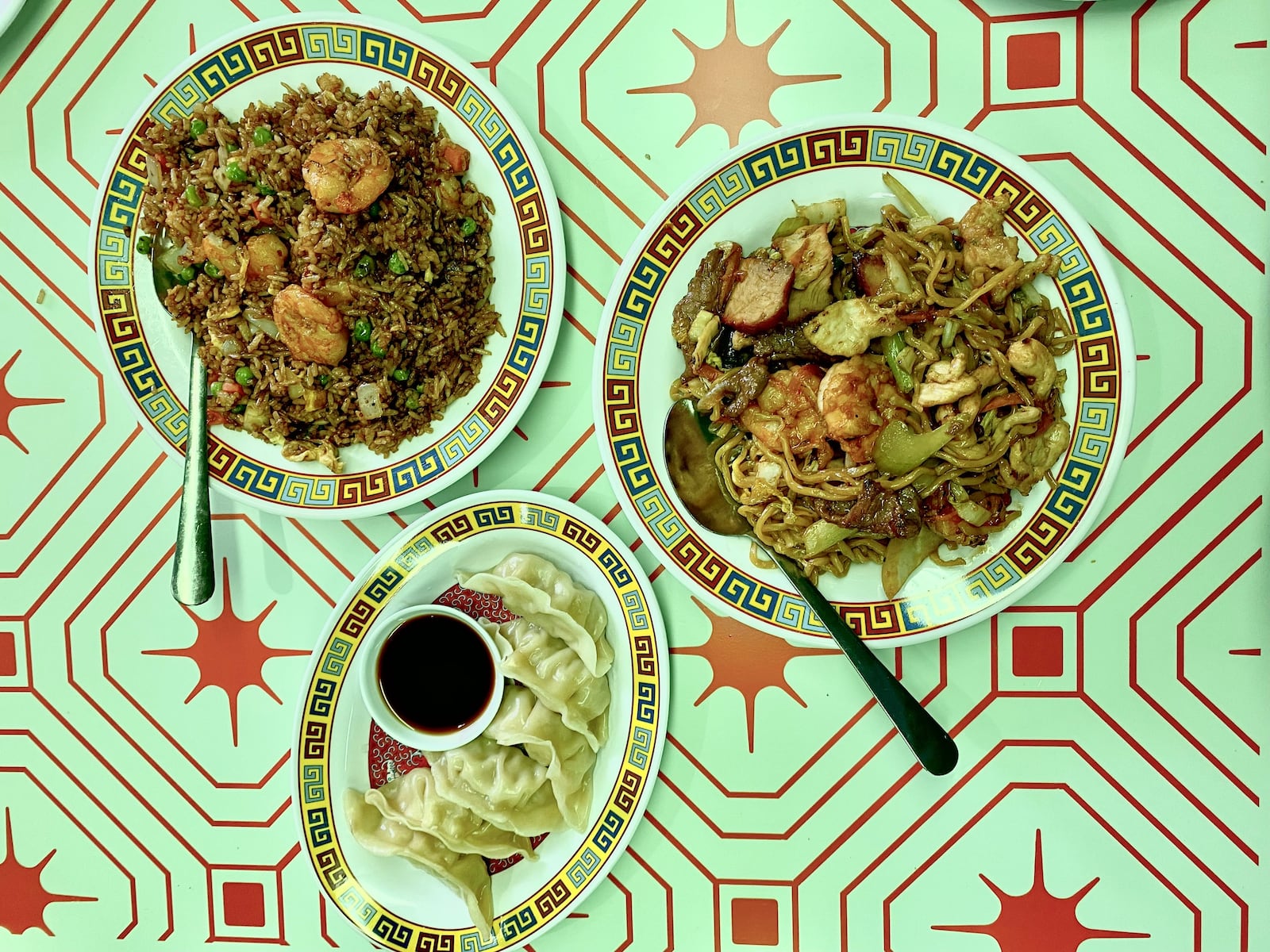 Big Boss offers a selection of Chinese American dishes, including (clockwise from top left) fried rice, lo mein and pot stickers. Ligaya Figueras/ligaya.figueras@ajc.com