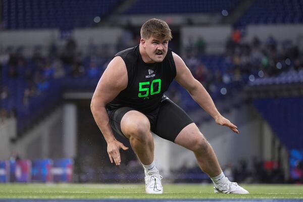 North Dakota State offensive lineman Grey Zabel runs a drill at the NFL football scouting combine in Indianapolis, Sunday, March 2, 2025. (AP Photo/Michael Conroy)