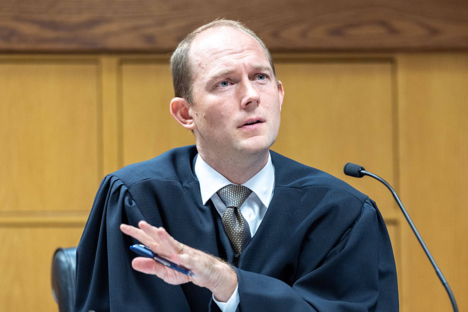 Judge Scott McAfee presides over a hearing regarding media access in the case against former President Donald Trump and 18 others at the Fulton County Courthouse in Atlanta on Aug. 31, 2023. (Arvin Temkar/The Atlanta Journal-Constitution/TNS)