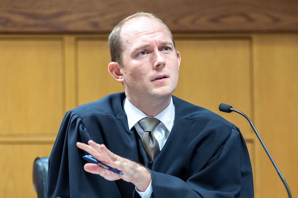 Judge Scott McAfee presides over a hearing regarding media access in the case against former President Donald Trump and 18 others at the Fulton County Courthouse in Atlanta on Aug. 31, 2023. (Arvin Temkar/The Atlanta Journal-Constitution/TNS)