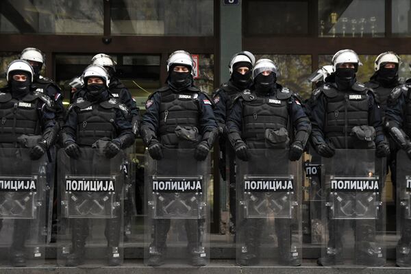 Serbian police officers guard a courthouse during anti-government protest demanding arrests over a deadly roof collapse at a railway station in Novi Sad, Serbia, Wednesday, Nov. 20, 2024. (AP Photo)