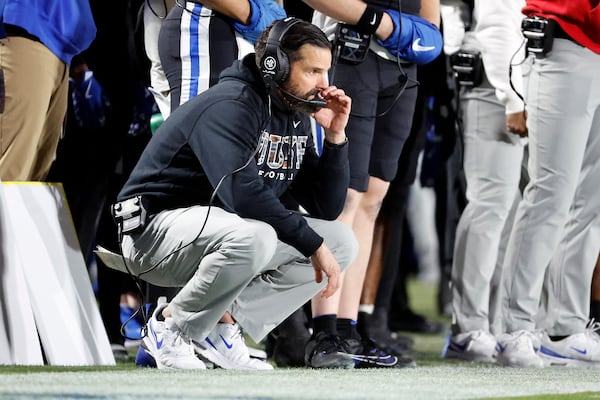 Duke head coach Manny Diaz watches from the sideline during the first half of an NCAA college football game against Virginia Tech in Durham, N.C., Saturday, Nov. 23, 2024. (AP Photo/Karl B DeBlaker)