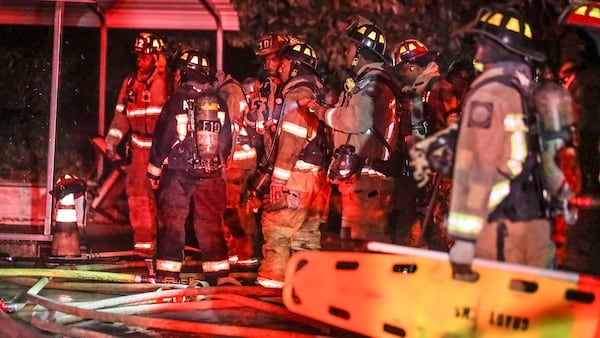 Atlanta firefighters worked a scene Thursday morning at a tire shop on Memorial Drive.