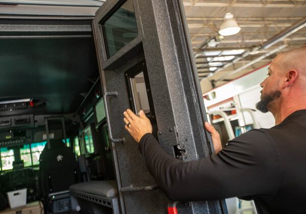 The South Metro SWAT team has not had an officer-involved shooting this year, but the BearCat serves as a barricade of sorts. Benjamin Griggs pointed out six holes on the sides of the vehicles that remain covered by metal plates unless the team must hop inside and angle their guns through the holes.