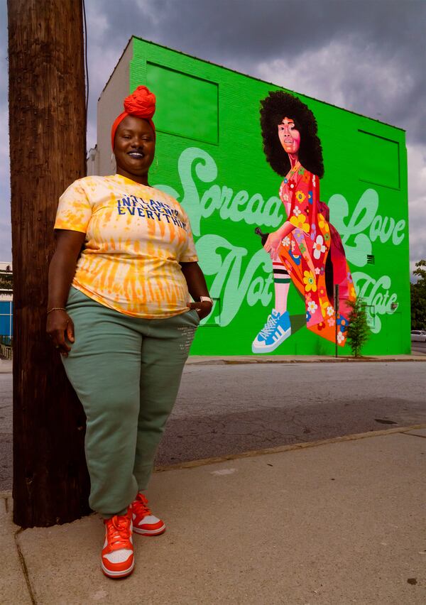 Atlanta artist Yuzly Mathurin finished her mural on the back of the Plaza Theatre in Poncey-Highland in the spring. She said it was by far the largest painting she has ever made and it empowered her to do more like it. (Courtesy of Brock Scott/Living Walls)