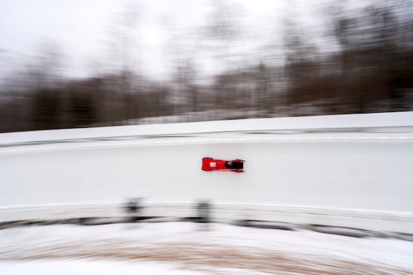 Agnese Campeol, of Thailand, races during the third run in the women's monobob at the bobsledding world championships, Sunday, March 9, 2025, in Lake Placid, N.Y. (AP Photo/Julia Demaree Nikhinson)