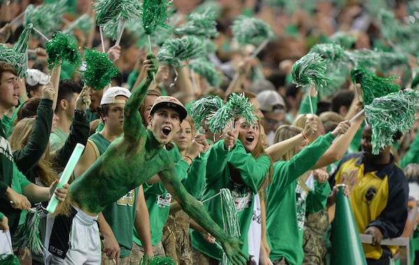 Roswell fans cheer during the Class AAAAAA State Championship Dec. 12, 2015, at the Georgia Dome. (Hyosub Shin/AJC)