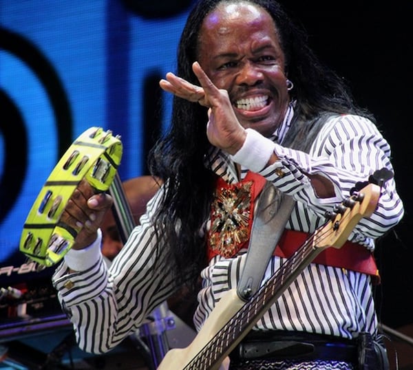 Legendary Earth, Wind & Fire bassist Verdine White gets his groove on during the EWF/Chicago show Aug. 4, 2015, at Aaron’s Amphitheatre at Lakewood. MELISSA RUGGIERI / MRUGGIERI@AJC.COM