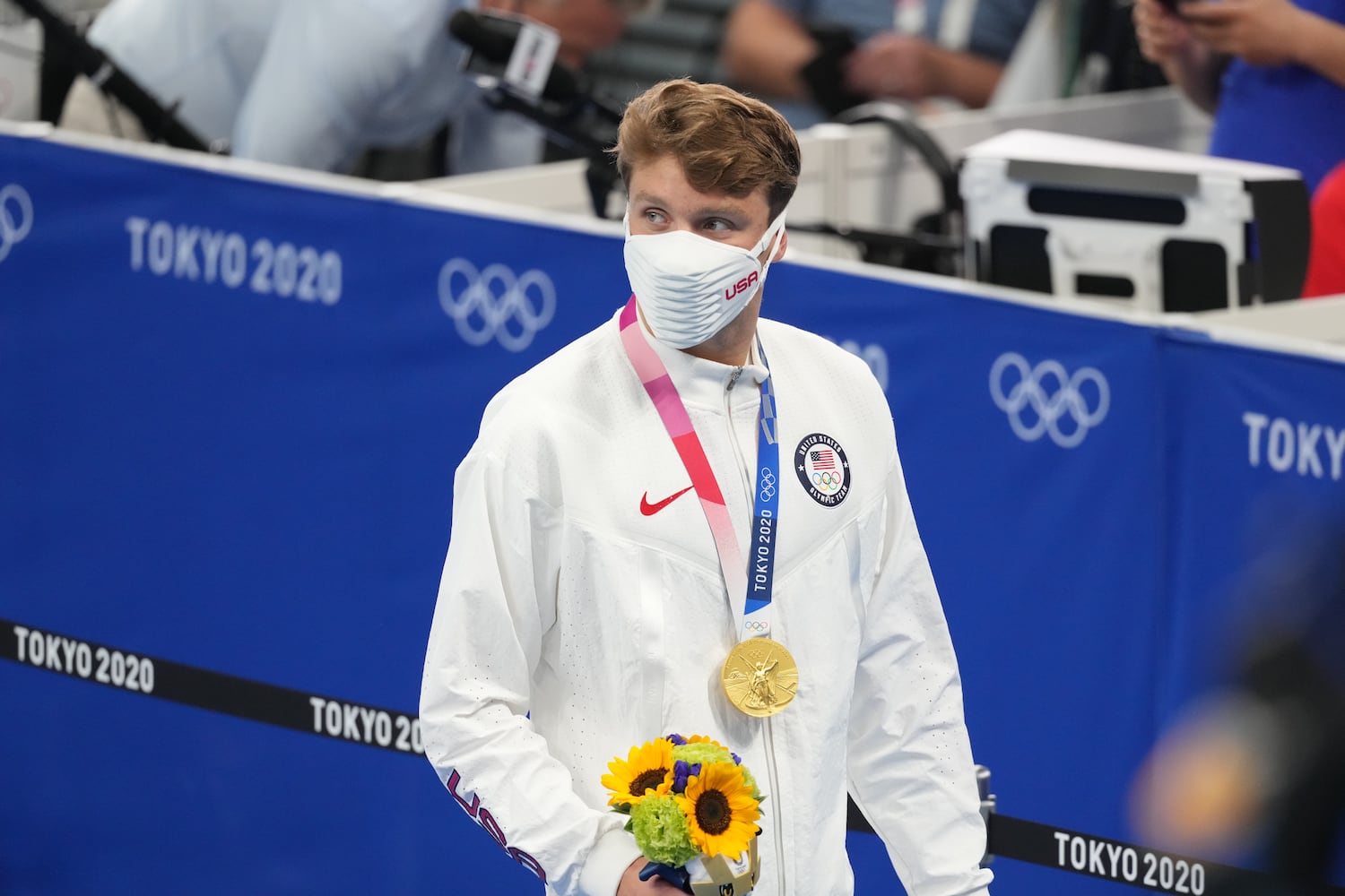 Robert Finke of the U.S. receives his gold medal for the men's 800 meter freestyle final during the Tokyo 2020 Olympics, at the Tokyo Aquatics Center, Thursday, July 29, 2021.  (Doug Mills/The New York Times)