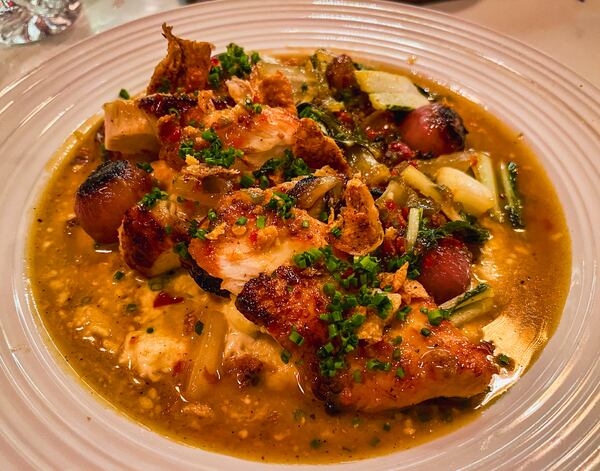 Marietta Proper's chicken a la Charles is full of intense flavors. Henri Hollis/henri.hollis@ajc.com