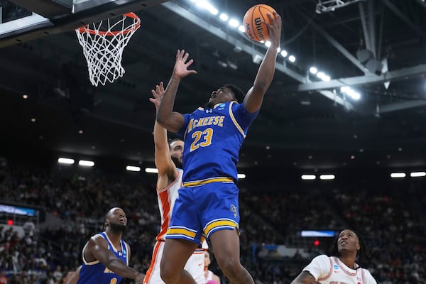 McNeese State guard Brandon Murray (23) drives to the basket against Clemson during the first half in the first round of the NCAA college basketball tournament, Thursday, March 20, 2025, in Providence, R.I. (AP Photo/Charles Krupa)