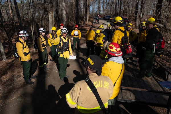 Tyler Tant, a forest ranger with the US Army Corps of Engineers, gives a briefing before a controlled burn in the Allatoona Wildlife Management Area in Ackworth on Thursday, Jan. 16, 2025.   Ben Gray for the Atlanta Journal-Constitution