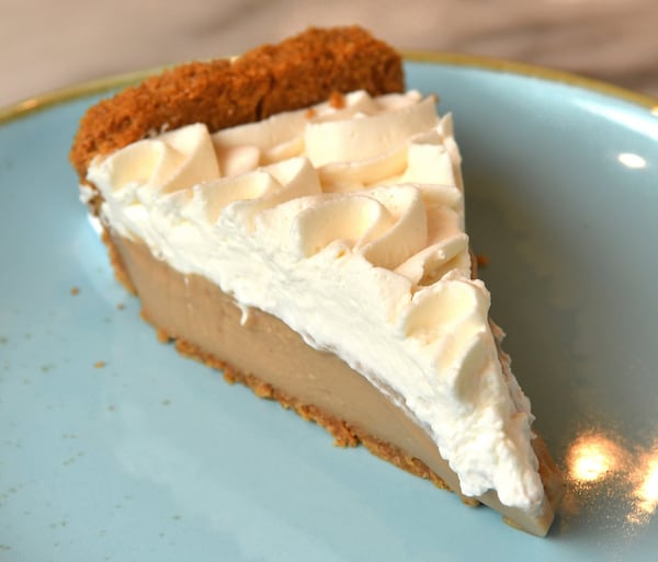 This Earl Grey Latte Pie has Graham Cracker Crust. STYLING BY PAUL ARGUIN AND CHRIS TAYLOR / CONTRIBUTED BY CHRIS HUNT PHOTOGRAPHY