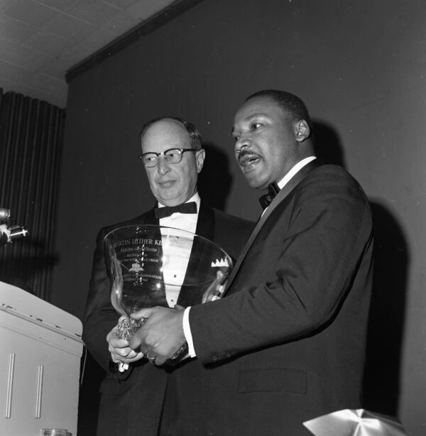 Martin Luther King, Jr. and Jacob M. Rothschild at the Nobel Peace Prize recognition dinner, National Conference of Christians and Jews, Dinkler Plaza Hotel, Atlanta, Georgia, January 27, 1965. LBSCB12-120lll, Lane Brothers Commercial Photographers Photographic Collection, 1920-1976. Special Collections and Archives, Georgia State University Library.