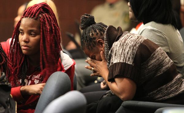 Melissa Alfred weeps in the jury box at the Douglas County Courthouse Monday. Alfred had maintained her composure throughout the sentencing hearing, but after defendant Kayla Norton’s statement to the court, she broke down and had to leave the court. (Henry Taylor / henry.taylor@ajc.com)