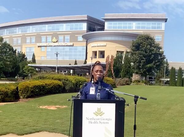 At a news conference Monday in Gainesville, Dr. Erine Raybon-Rojas, a critical care physician at North Georgia Medical Center, urged people to get vaccinated as COVID-19 hospitalizations spike. (NGMC Facebook livestream)