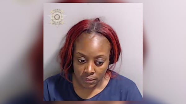 Latasha Baker was arrested Thursday and charged with possession of prohibited items by an inmate and violation of oath by a public officer, the Fulton County Sheriff's Office said.