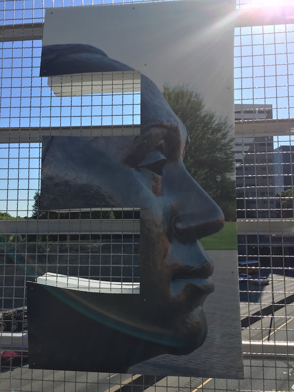 John Wesley Dobbs is depicted in one of the letters spelling out “Peachtree” in new bridge signage along Peachtree Street between Ralph McGill Boulevard and Pine Street.