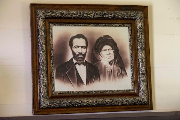 A portrait of Harry, left, and Eliza Stephens is displayed over a fireplace in a small house located on the property at A.H. Stephens State Park in Crawfordville, Georgia on Monday, July 13, 2020.  (ALYSSA POINTER / ALYSSA.POINTER@AJC.COM)