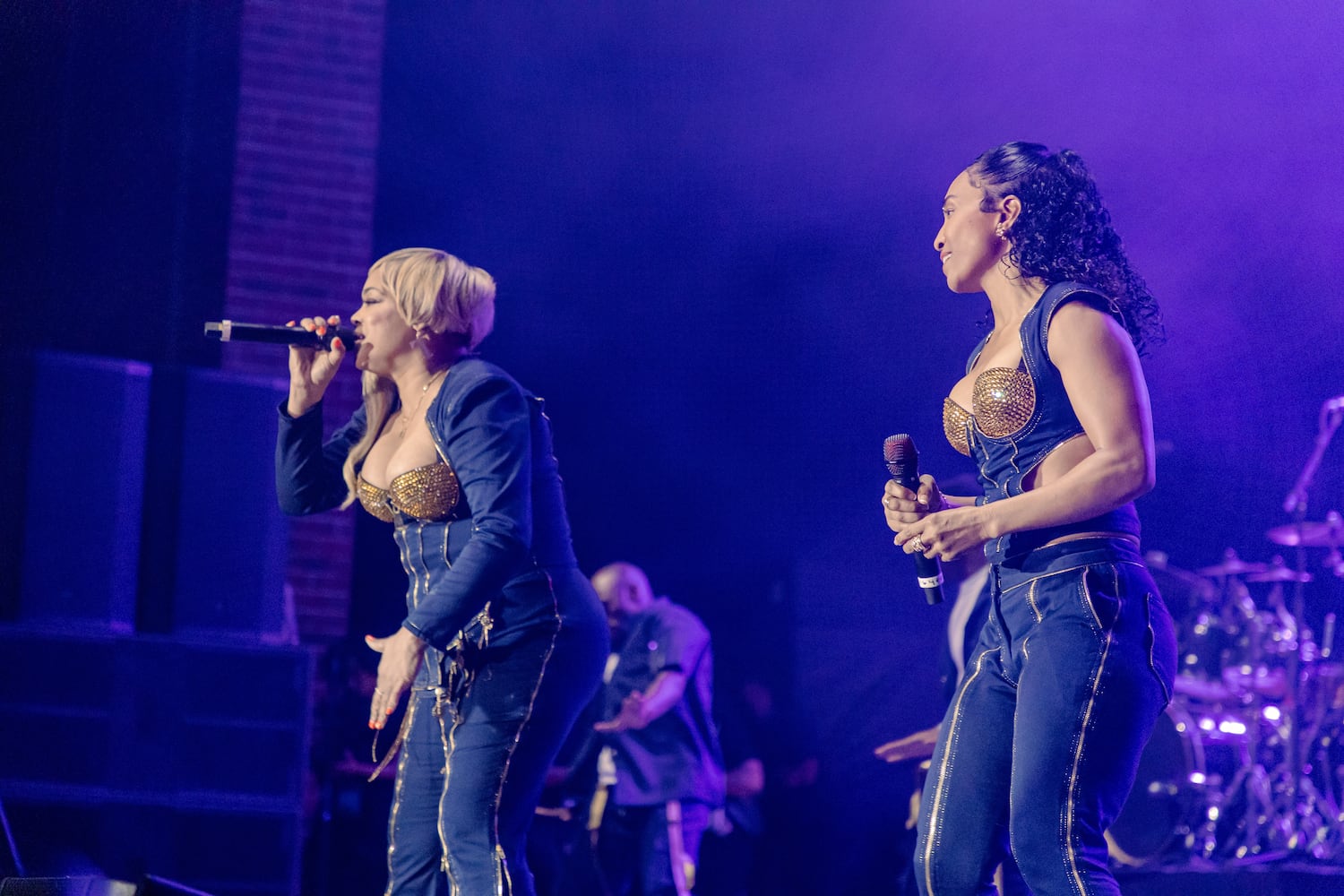 Atlanta's own TLC -- Tionne "T-Boz" Watkins and Rozonda "Chilli" Thomas -- perform before a packed audience Saturday, June 8, 2024 at the Stockbridge Amphitheater in Henry County. Credit: Kymani Culmer for the Atlanta Journal-Constitution