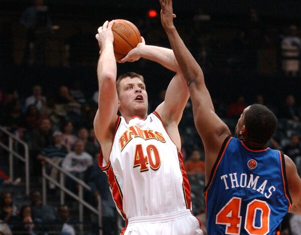 The Hawks' Jason Collier puts up a shot in March of 2005. Collier, 28, died on October 15, 2005. 