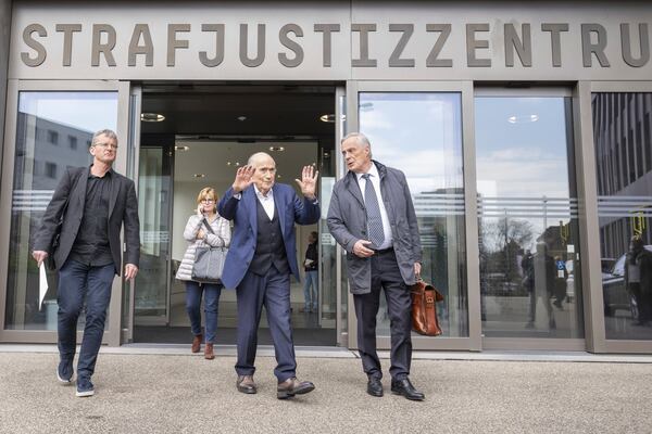 Former Fifa President, Sepp Blatter, centre, and his lawyer Lorenz Erni, right, after the verdict at the special appeals court, in Muttenz, Switzerland, Tuesday, March 25, 2025. (Urs Flueeler/Keystone via AP)