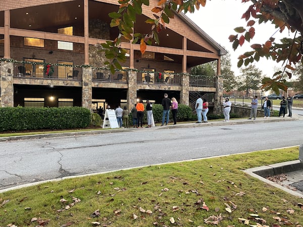 Voters lined up at the Merle Manders Conference Center in Stockbridge on Tuesday.