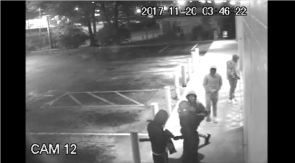 Five people were seen in surveillance video outside the store in DeKalb County. (Credit: ATF)