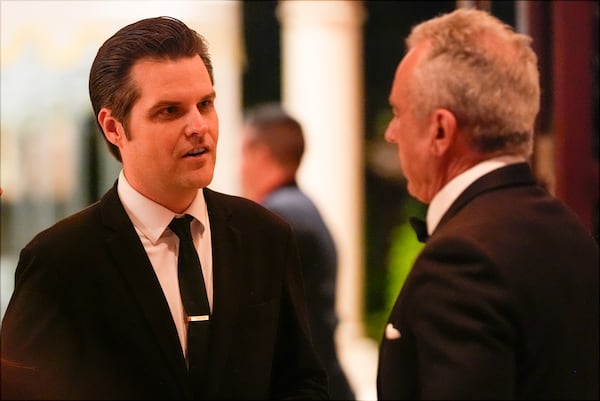 Matt Gaetz talks with Robert F. Kennedy Jr., before President-elect Donald Trump speaks during an America First Policy Institute gala at his Mar-a-Lago estate, Thursday, Nov. 14, 2024, in Palm Beach, Fla. (AP Photo/Alex Brandon)