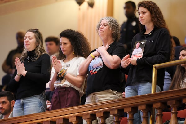 Family members of Israel hostages react as they are honored by the House of Representatives during day two of the legislative session at the State Capitol, Tuesday, Jan. 14, 2025, in Atlanta. (Jason Getz / AJC)